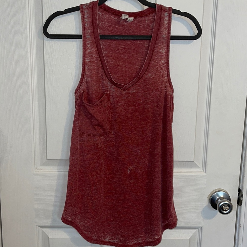 Maroon tank with pocket.